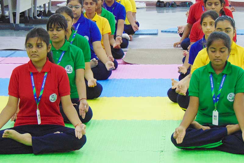 Students attending Yoga classes 